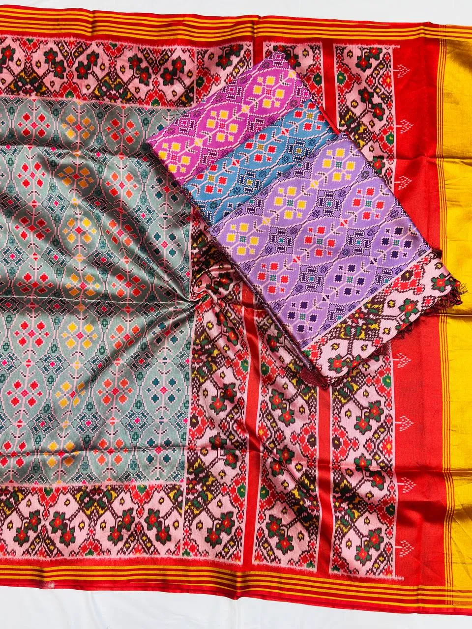 RGS Patola Silk Ikkat Prined Zari Saree Wholesale Surat