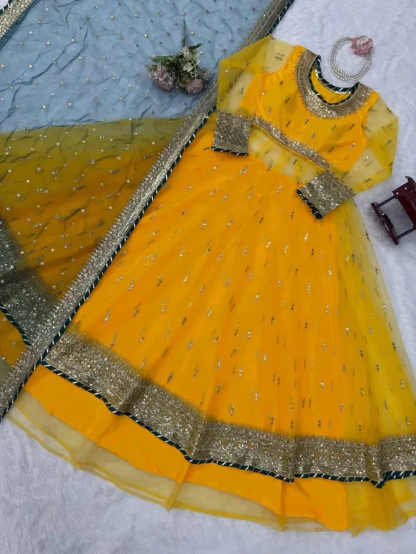 Beautiful Deepika 6033 Net Thread Sequence Haldi Lehngha Gown With Dupatta Collection 2026
